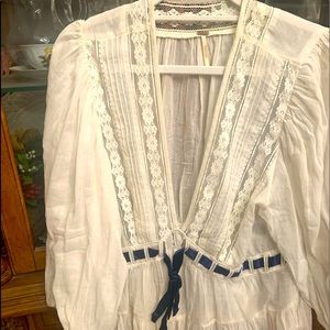 Cream color with navy blue ribbon lacy feminine front tie top
